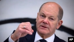 Federal Chancellor Olaf Scholz speaks at a press conference after the federal-state summit at the Federal Chancellery in Berlin, Nov. 7, 2023.