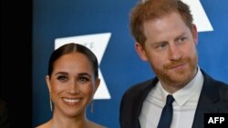 Hoàng tử Harry và phu nhân Meghan trong một sự kiện ở New York, Mỹ, 6/12/2022.