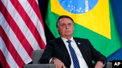 Brazilian President Jair Bolsonaro speaks at a meeting with President Joe Biden during the Summit of the Americas, June 9, 2022, in Los Angeles.