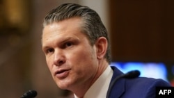 Pete Hegseth, US President-elect Donald Trump's nominee for Defense Secretary, testifies during his confirmation hearing before the Senate Armed Services Committee on Capitol Hill on January 14, 2025 in Washington, DC. (Photo by ALLISON ROBBERT / AFP)