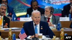 US President Joe Biden speaks during the launch of the Task Force for a Global Alliance Against Hunger and Poverty in Rio de Janeiro, on the sidelines of the G20 Summit, November 18, 2024. (Photo by ERIC LEE / POOL / AFP)