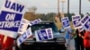 General Motors assembly workers picket outside the General Motors Bowling Green plant during the United Auto Workers (UAW) national strike in Bowling Green, Kentucky.