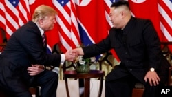 Tổng thống Trump và Chủ tịch Kim.