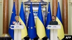 European Commission President Ursula von der Leyen (L) speaks during a joint press conference with Ukrainian President Volodymyr Zelensky in Kyiv, on September 20, 2024, amid the Russian invasion in Ukraine.