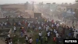 Guinea stadium crush kills 56 people after disputed refereeing decision