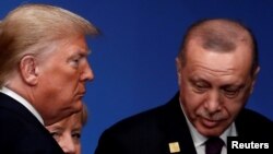 ABD Başkanı Donald Trump- Cumhurbaşkanı Recep Tayyip Erdoğan 4 Aralık 2019'da İngiltere'nin Watford kentinde düzenlenen NATO liderler zirvesinde. (ARŞİV)