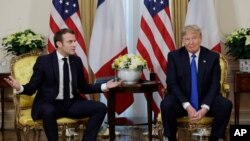 President Donald Trump meets French President Emmanuel Macron at Winfield House, Tuesday, Dec. 3, 2019, in London. (AP Photo/ Evan Vucci)