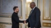 This handout photograph taken and released by the Ukrainian Presidential Press Service on October 21, 2024 shows Ukrainian President Volodymyr Zelensky (L) and US Secretary of Defense Lloyd Austin shaking hands during their meeting in Kyiv.