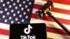 Illustration shows U.S., Chinese flags, TikTok logo and gavel