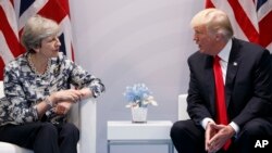 Tổng thống Hoa Kỳ Donald Trump họp với Thủ tướng Anh Theresa May tại Hội nghị Thượng đỉnh G20 ở Hamburg, Đức (ảnh tư liệu ngày 8/7/2017)