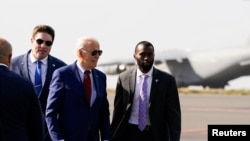 U.S. President Joe Biden boards Air Force One en route to Angola, in Sal