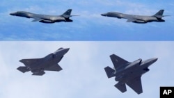 Máy bay siêu thanh B-1B cùng 4 chiến đấu cơ tàng hình F-35B của Mỹ.