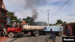 Haitians flee homes from gang violence, in Port-au-Prince