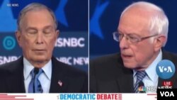 Ứng cử viên Dân chủ Michael Bloomberg và Bernie Sanders.