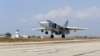 Máy bay Sukhoi Su-24 của Nga cất cánh từ căn cứ không quân Hmeimim ở tỉnh Latakia, Syria, 3/10/2015.