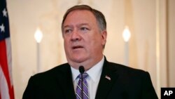 Ngoại trưởng Mỹ Mike Pompeo phát biểu trong buổi công bố Báo cáo Buôn người 2019 tại Bộ Ngoại giao Mỹ ở Washington, ngày 20 tháng 6, 2019.