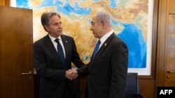 This handout photo released by the US State Department on June 10, 2024, shows US Secretary of State Antony Blinken (L) meeting with Israeli Prime Minister Benjamin Netanyahu in Jerusalem on June 10, 2024.