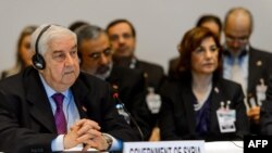 Ngoại trưởng Syria Walid Muallem và phái đoàn trong cuộc hòa đàm Geneva II hồi tháng 1, 2014. 