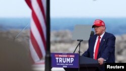 FILE PHOTO: Former U.S. President and Republican presidential candidate Trump holds a campaign event, in Racine