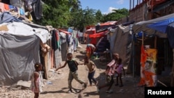 Haitians displaced by gang violence take shelter in refugee camp, in Port-au-Prince