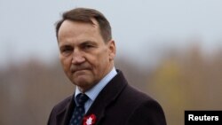 Poland's Foreign Minister Radoslaw Sikorski speaks during the inauguration of an American ballistic missile defense base