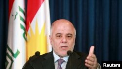 Thủ tướng Iraq Haider al-Abadi trong một buổi họp báo.