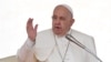 Pope Francis blesses the crowd during the weekly general audience on September 25, 2024 at St Peter's square in The Vatican. (Photo by Tiziana FABI / AFP)